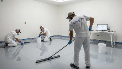 Epoxy floor coating in Fort Collins CO garage by professional painters for durable, sleek finish