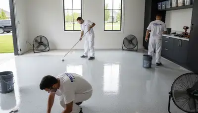 Garage floor epoxy coating in Fort Collins CO applied by professional house painters for durable finish