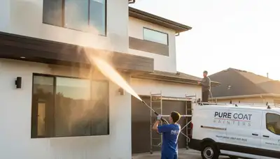 Professional pressure washing a Fort Collins CO home exterior by local house painting experts